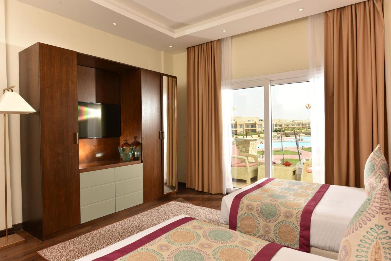 Tolip North Coast Hotel El Alamein Exterior photo A bedroom at the hotel