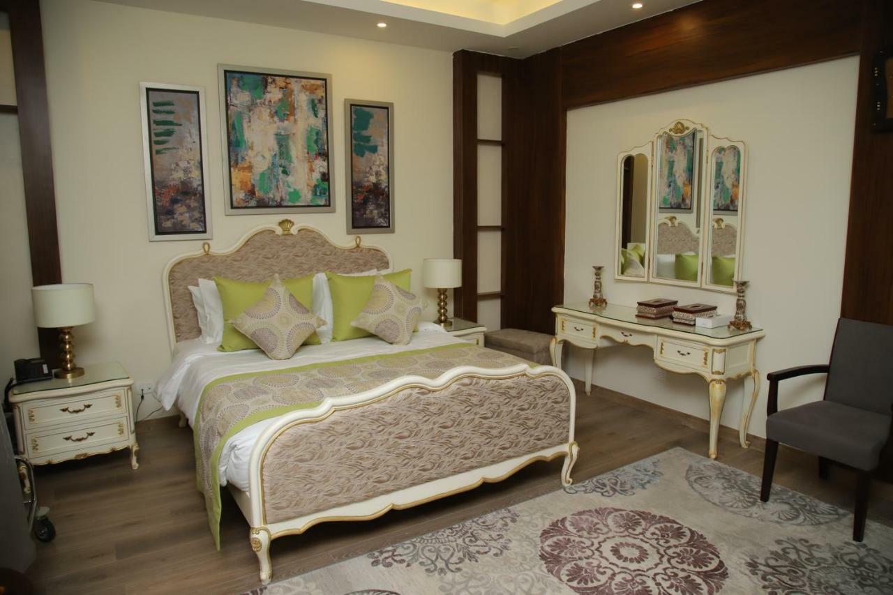 Tolip North Coast Hotel El Alamein Exterior photo A bedroom at the hotel